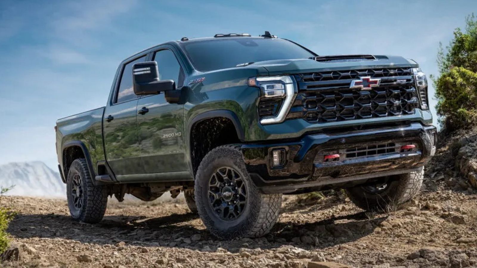 GMC Sierra HD του 2027 σε βραχώδες έδαφος με diesel κινητήρα Duramax V8 8,3 λίτρων.