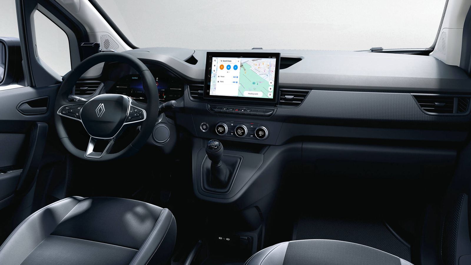 Ταμπλό Renault Kangoo Van με οθόνη πλοήγησης, τιμόνι και χειροκίνητο κιβώτιο ταχυτήτων.